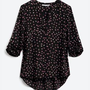 Daniel Rainn “Koda” split neck black with floral design blouse. Size L.